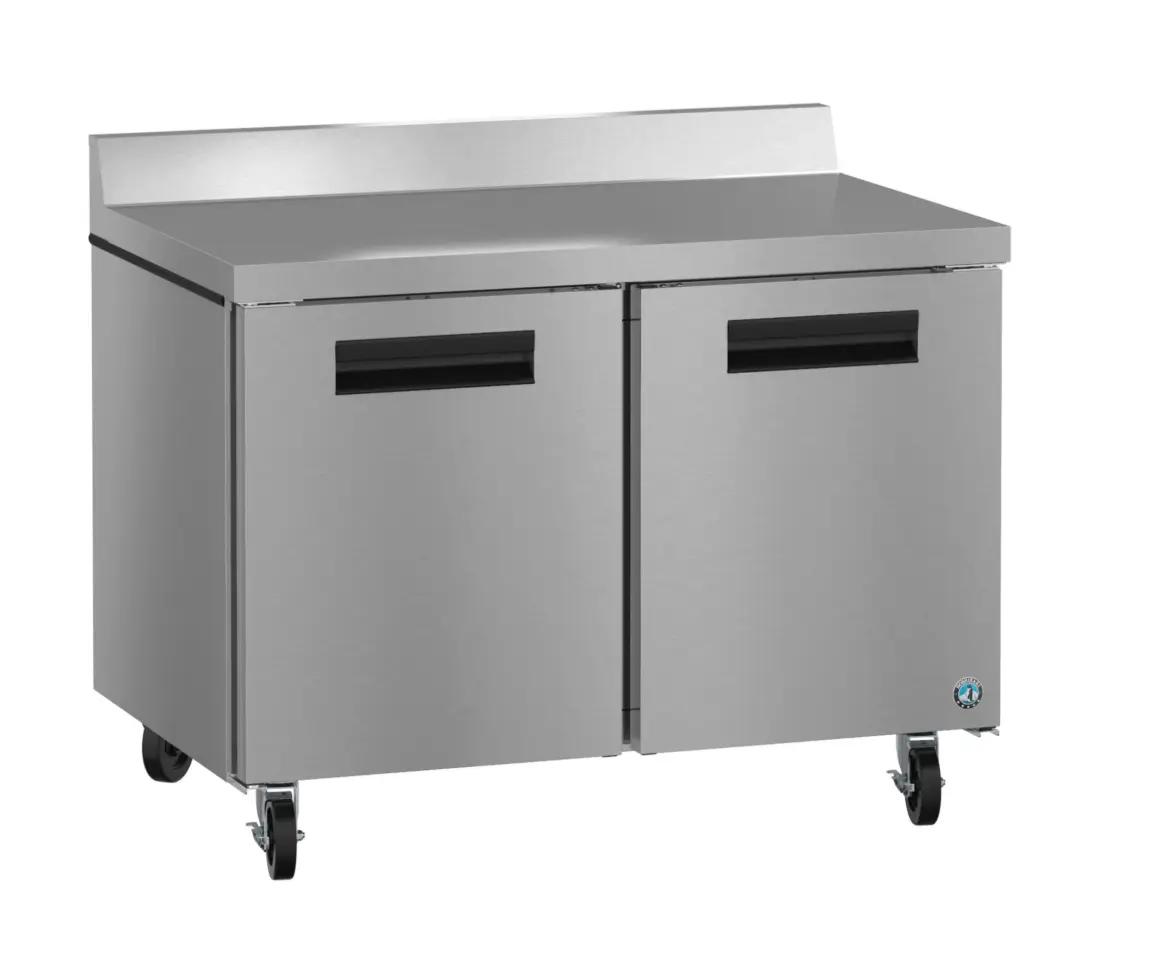 Stainless steel under-counter refrigerator with two doors and casters.
