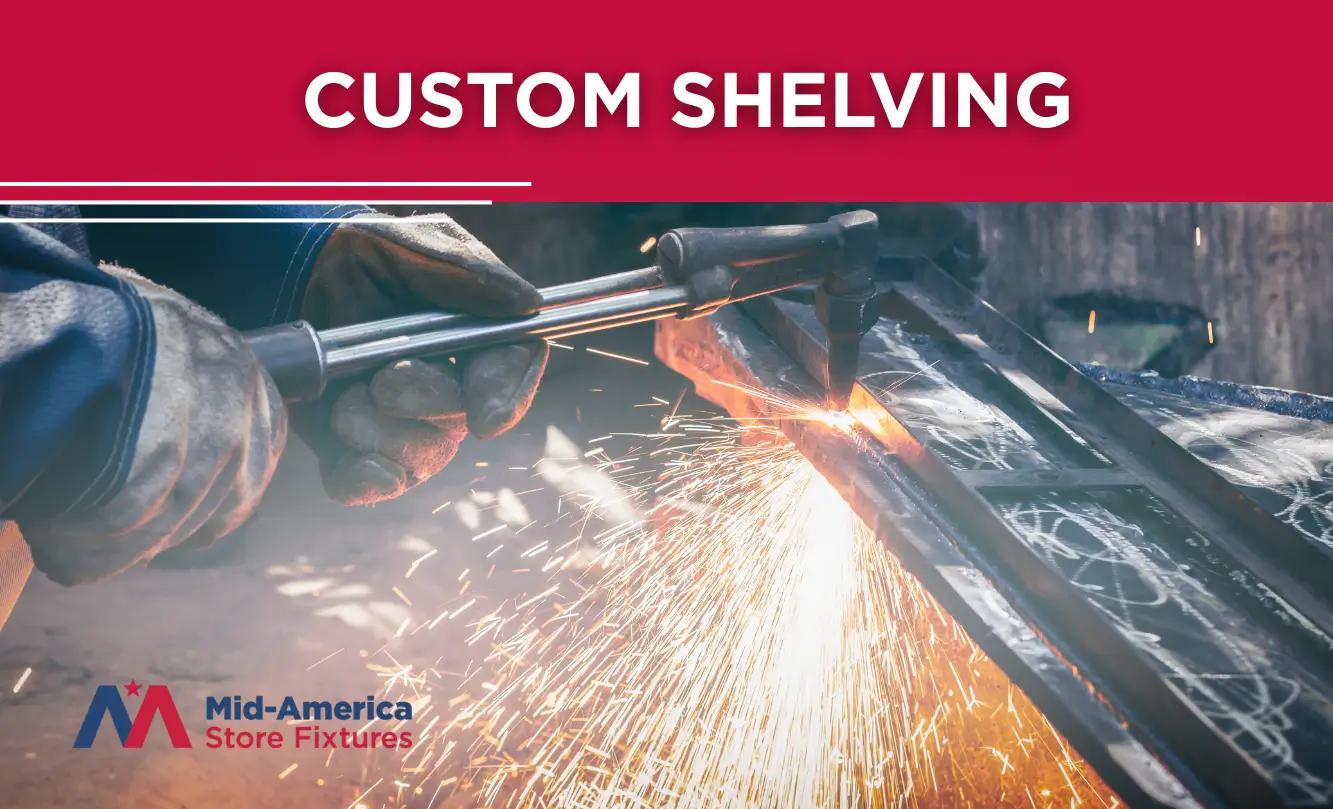 Close-up of metal welding with sparks flying, promoting custom shelving, with Mid-America Store Fixtures logo.