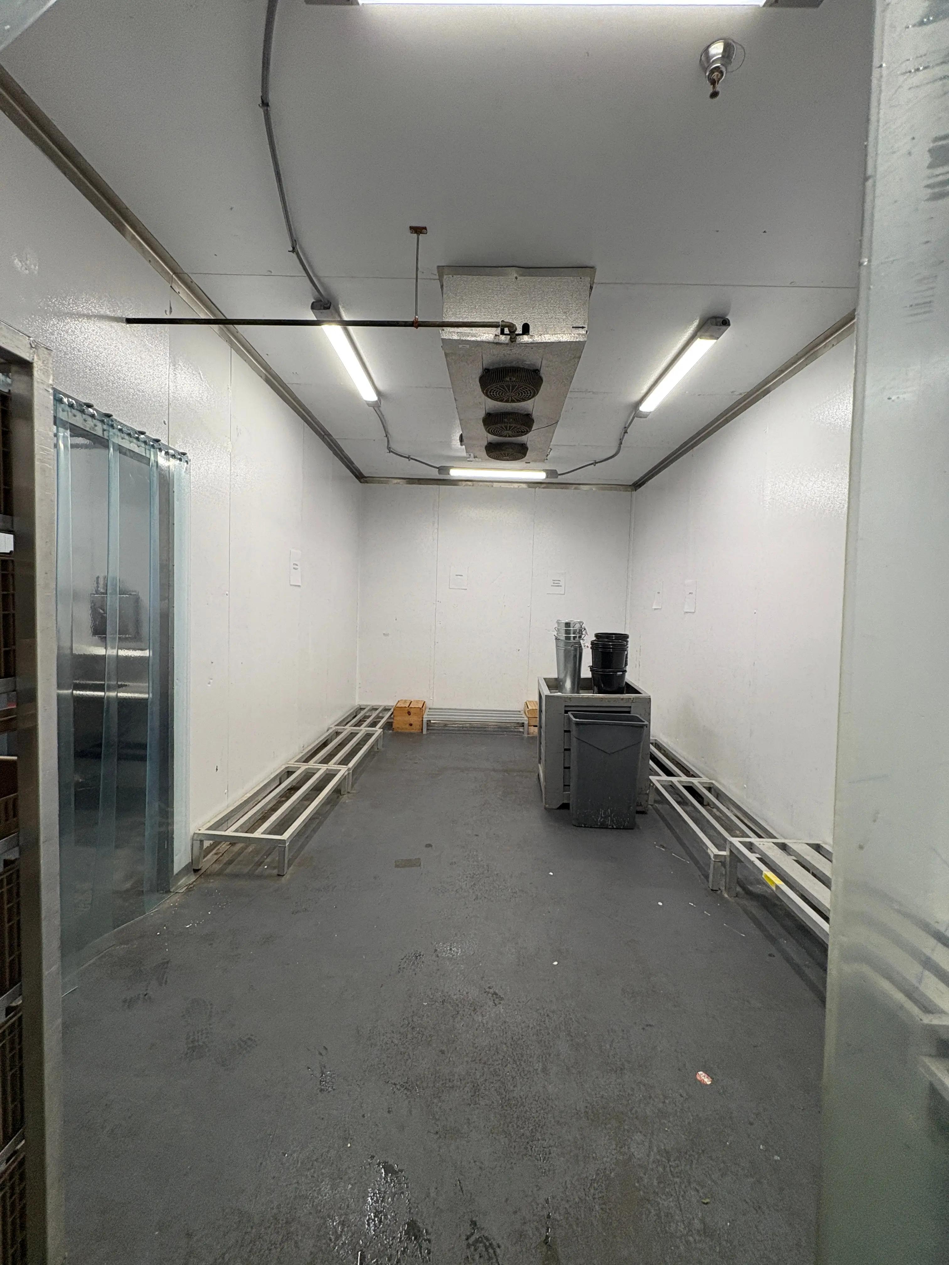 Walk-in freezer interior from food distribution facility, commercial cold storage space available through Mid-America Store Fixtures