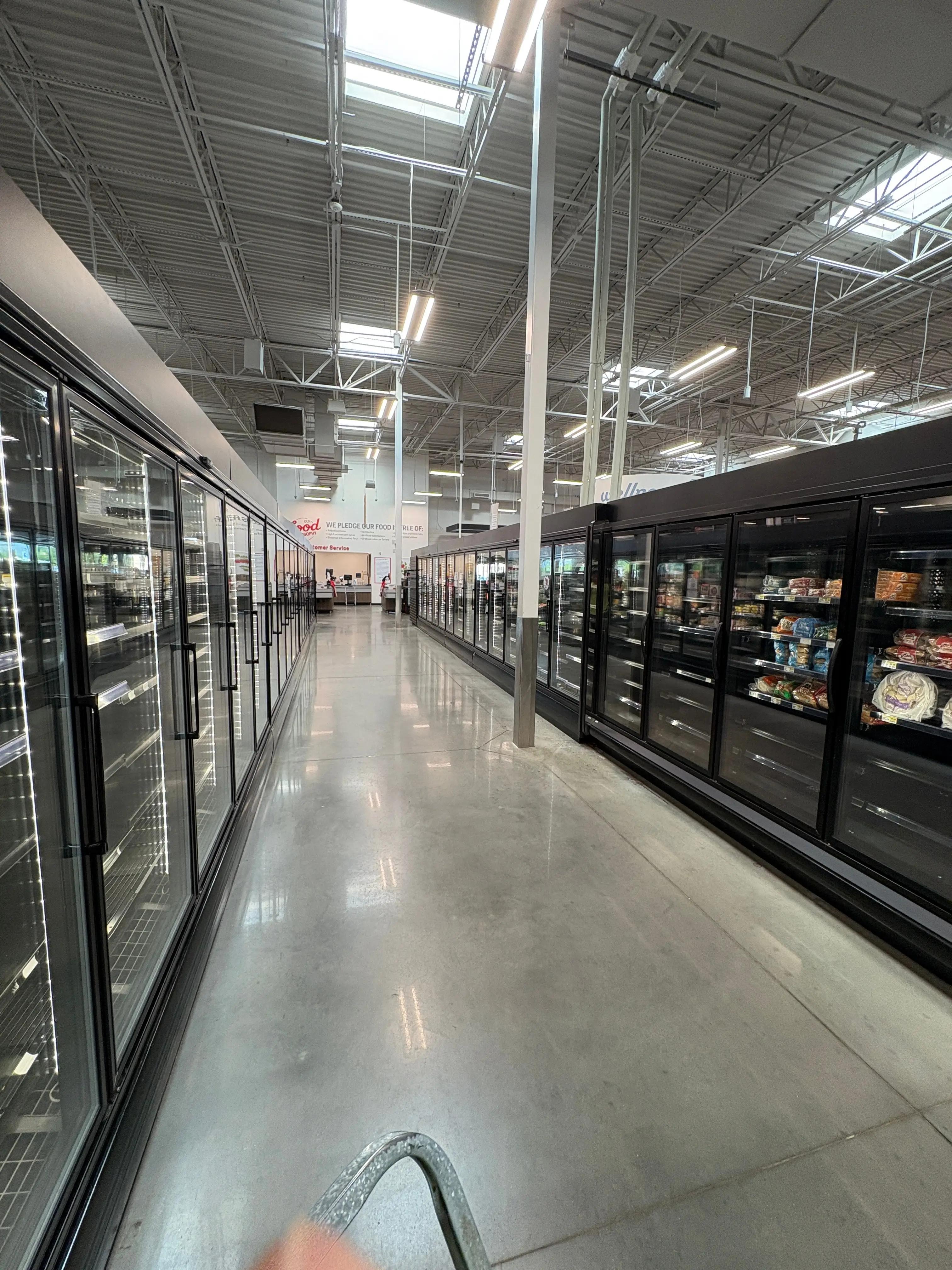 Glass door refrigerated merchandisers from grocery store liquidation, commercial freezer and cooler cases available through Mid-America Store Fixtures