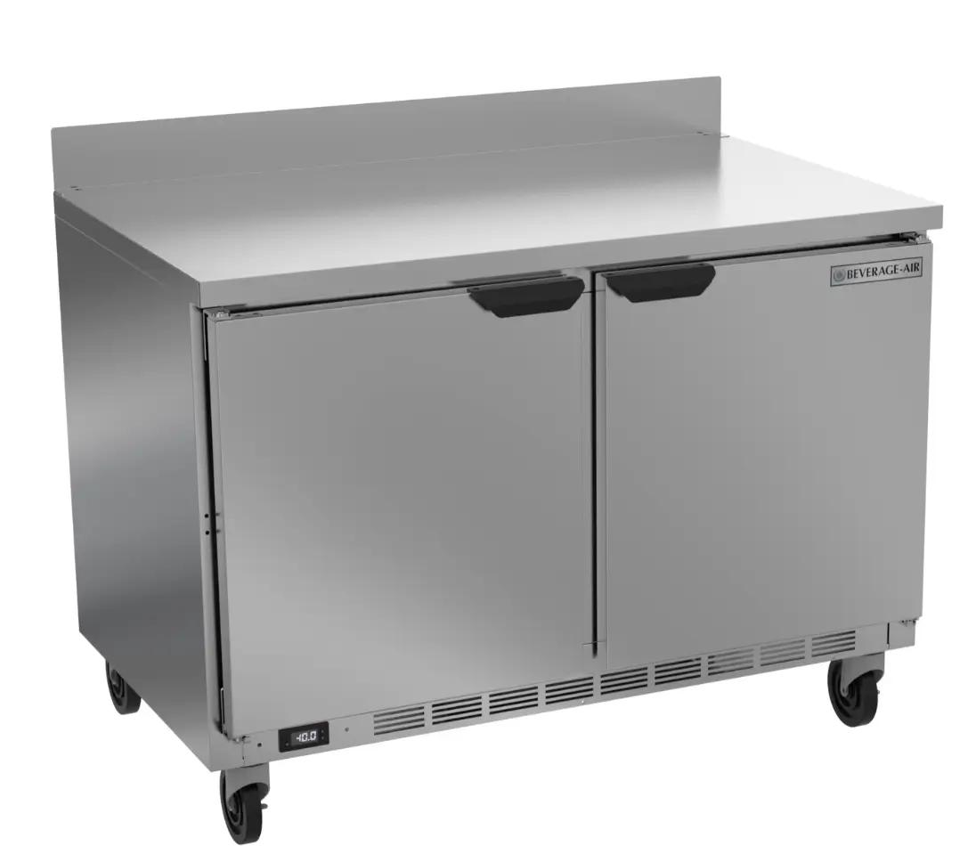 A stainless steel commercial double door refrigerator with wheels and digital temperature display.