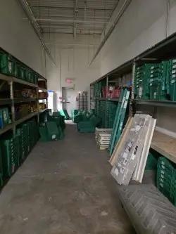 Backroom storage shelving with plastic bins for retail inventory organization and warehouse storage solutions