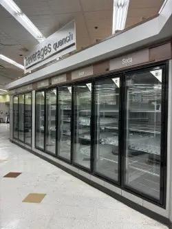 Multi-door glass reach-in refrigerated display cases for grocery store beverage and dairy merchandising